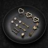 imageORAZIO 14G Nipple Rings for Women Surgical Steel Belly Button Ring Butterfly Daisy Flower Nipple Barbells CZ Heart Curved Navel Rings 12 PCS Nipple Piercings Jewelry SetGold Tone