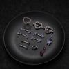 imageORAZIO 14G Nipple Rings for Women Surgical Steel Belly Button Ring Butterfly Daisy Flower Nipple Barbells CZ Heart Curved Navel Rings 12 PCS Nipple Piercings Jewelry SetPurple