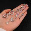 imageORAZIO 14G Nipple Rings for Women Surgical Steel Belly Button Ring Butterfly Daisy Flower Nipple Barbells CZ Heart Curved Navel Rings 12 PCS Nipple Piercings Jewelry SetSilver Tone