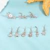 imageORAZIO 9 PCS Dangle Nose Rings  L Shaped for Women 20G Stainless Steel Nose Rings Studs with CZ Cross Crown Flower Heart Dangling Piercing JewelryLRose Gold